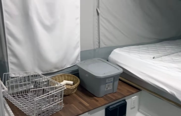 Smell cabinet space above mini fridge