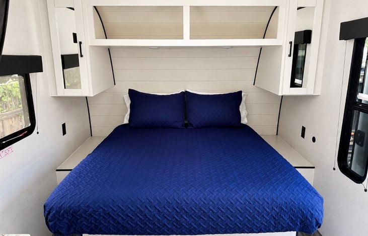 Queen Bed - Can be curtained off from main area