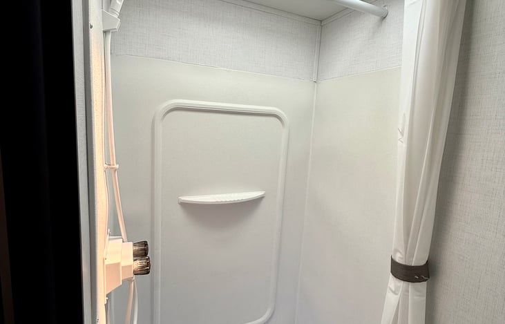 Shower provides quick rinse options or can be used for extra storage when not in use—versatile and convenient.