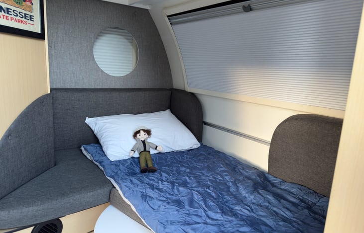 Dinette converts to bed. All windows include blackout shades and bug screens.

Dinette bed comes with fitted sheet, sleeping bag, blanket, and pillow.