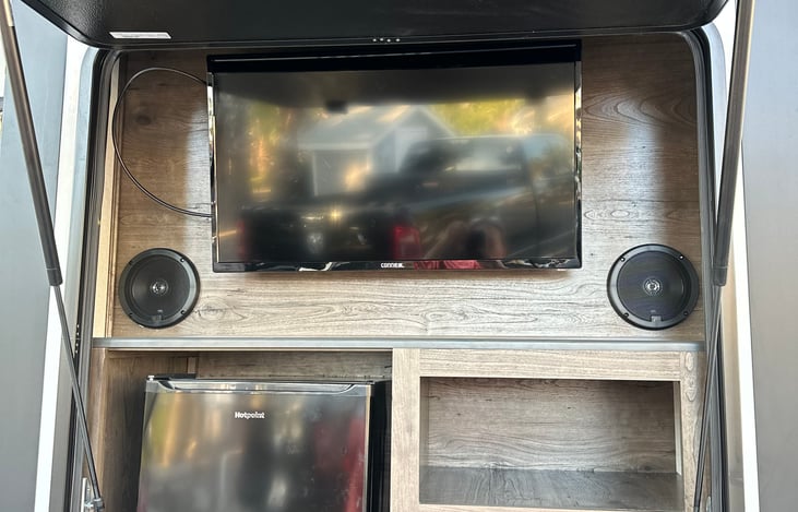 Outside fridge and tv