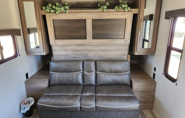 Murphy bed converts to couch for more daytime space and seating.