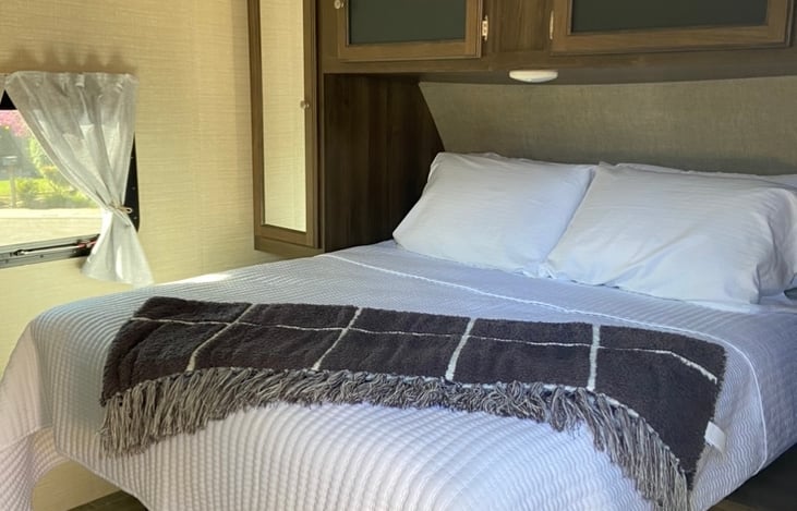 Queen size bed with under storage.