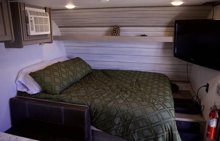 Upgraded queen mattress with a TV and Xbox One included.