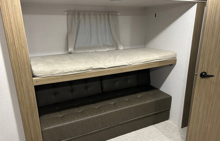 Right side of the bunk room sleeps 2-3 people.  The bottom bunk lets out to a double bunk bed.  This room sleeps up to 5 people.