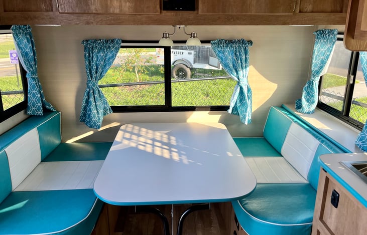 Roomy dining area reflecting the fun loving spirit of the 50's. Sleek retro design and accents!