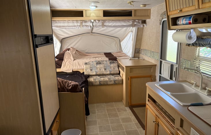 Another view of the kitchen and front beds