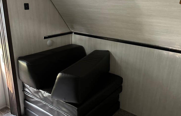 Single bunk plus two fold out twin mattresses.