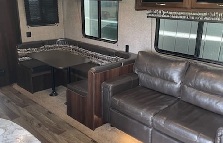 Pull out couch bed and table that turns into bed.