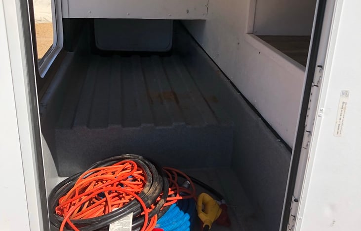 Huge storage! For chairs, tables, BBQ, luggage, and firewood.