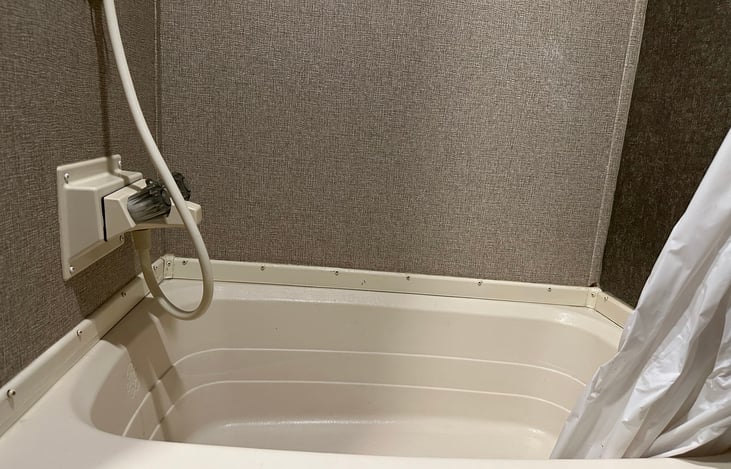This camper has a shower with a small tub to help you stay clean.