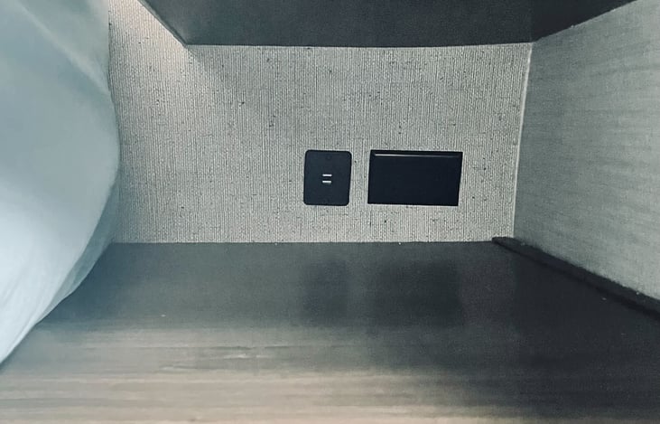 USB and standard outlet next to the bed.