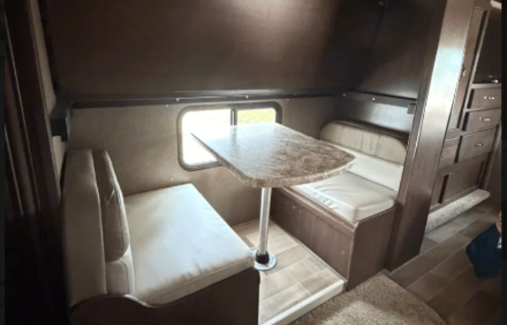Bunk area with beds stowed away.