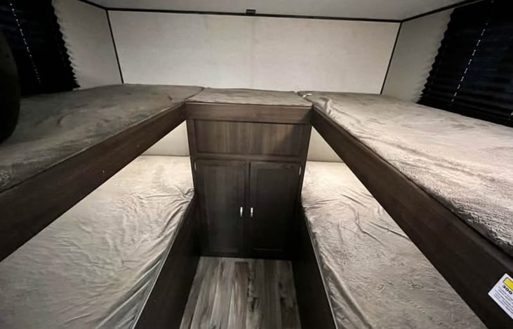 Bunk Room. 4 beds as well as large storage cabinet.