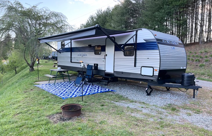 19' Electric Awning. Patio Mat and Tiki Torches included