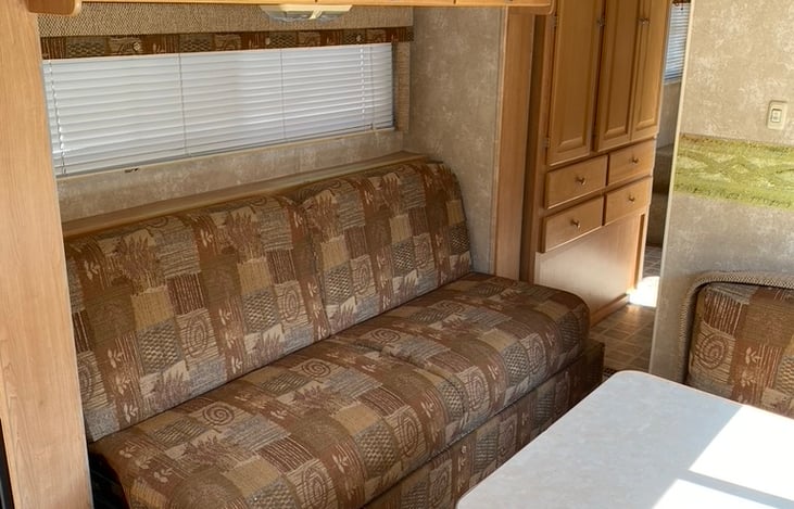 Fold-out sofa with slide-out for extra space.