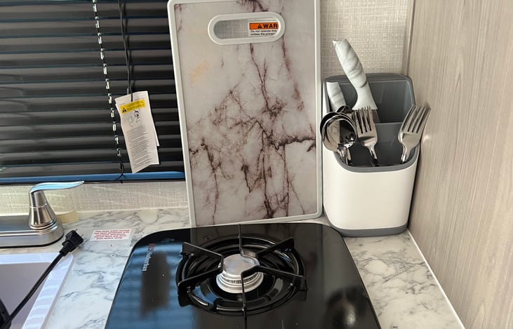 Cutting board, knives and kitchen utensils