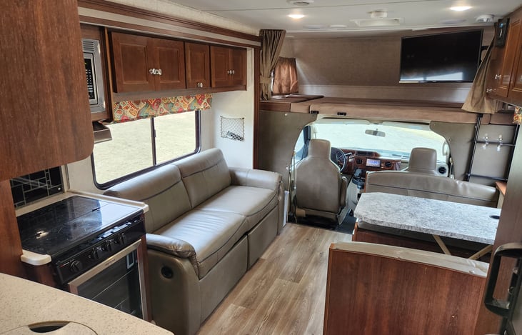 Roomy living space with sofa and dinette both able to covert to beds