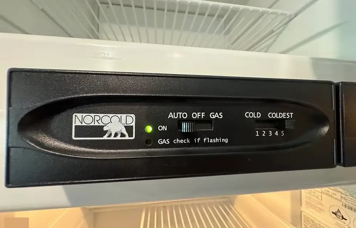 Automated switching from Gas to Electric to Shore Power, keeps the fridge cold even as you drive down the road.