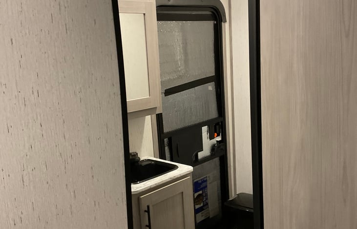 bathroom has an entry door.