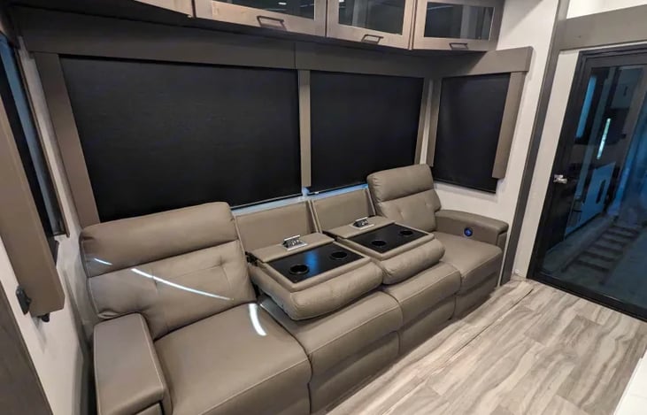 Here you see sofa has cup holders and electrical outlets for charging phones, laptops, tablets, etc.