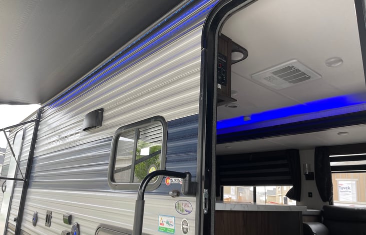 Awning with blue lighting/outdoor speakers