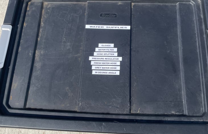 Labelled water storing box and all equipment included.