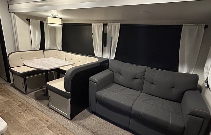The dinette allows plenty of room for all of your guests to gather around for game night and the sofa is the perfect place to crash at the end of a long day