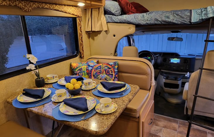 Beautiful dinette.  All the seats here have seat belts so you can hang out here, play cards or even enjoy a beverage while the RV is moving.