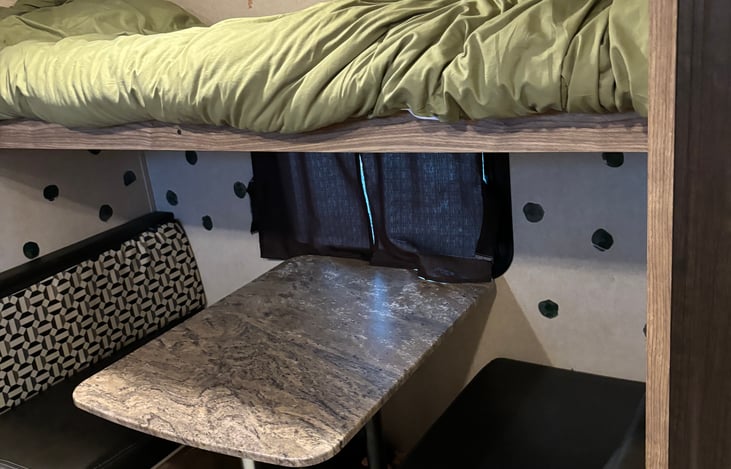 Bottom table turns into another bed!