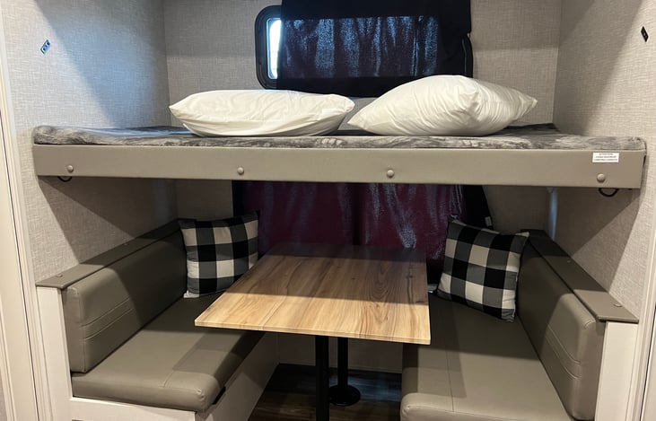Bunkhouse table that converts to bed
