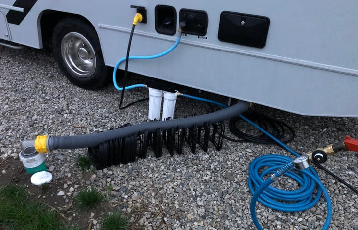 Included plumbing and water hoses.