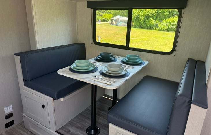 Large dinette in slide out comfortable seats four