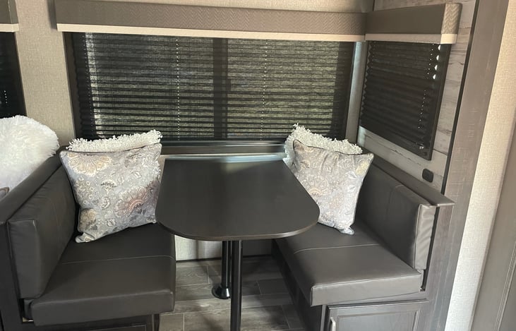 Table folds down into full size bed.That holds two people