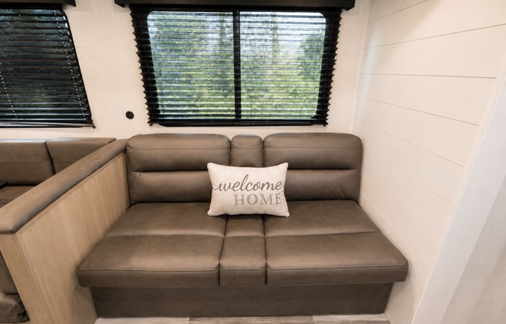 This couch does pull out to sleep smaller person!