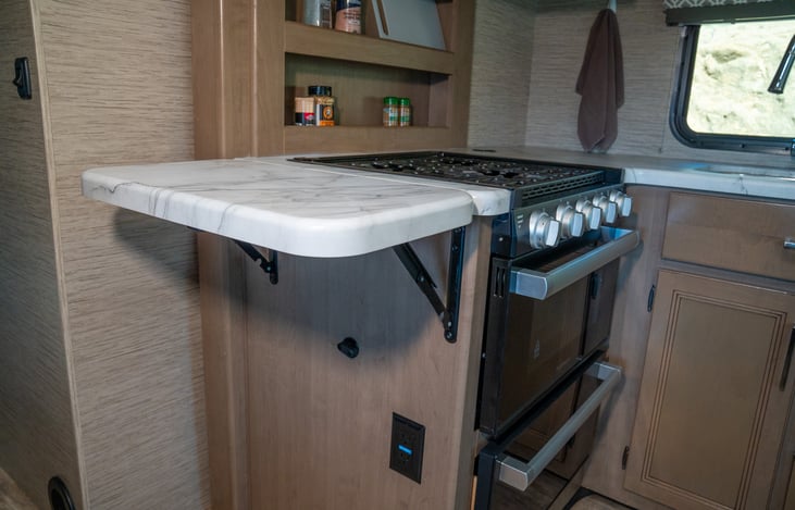 Fold-down counter can be raised when you need extra counter space and down when you don't.