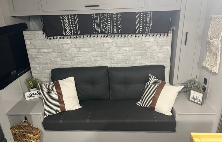 Murphey bed behind couch