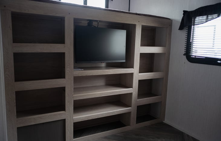 Tv and cubbies in the back room for the kids to play!