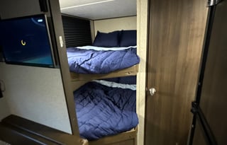 Cozy, lightweight 9 person travel trailer