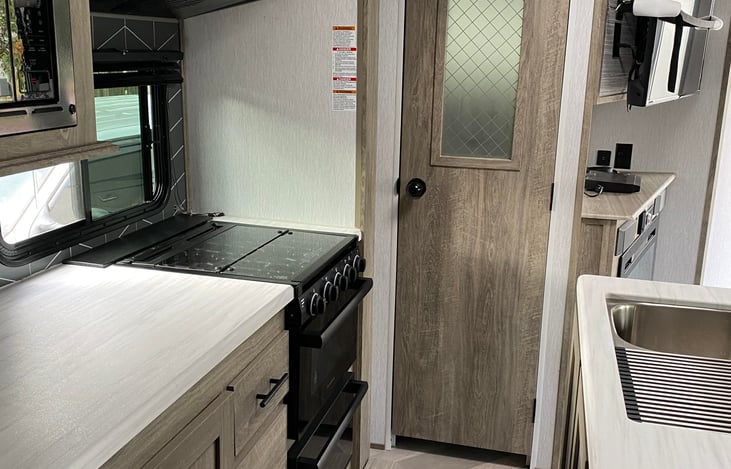 Kitchen and door to the pantry