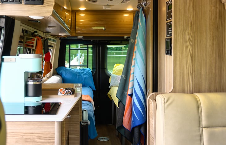 Induction stove w/ induction compatible pans included.  This stove is amazing.  It will boil 8 cups of water in under 3 minutes!