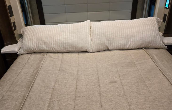 King size bed has lots of storage over and under it.