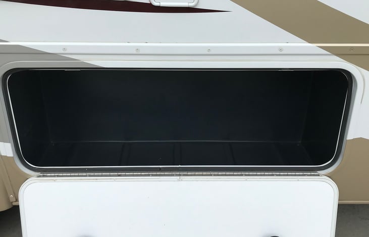 Passenger side storage compartment #1