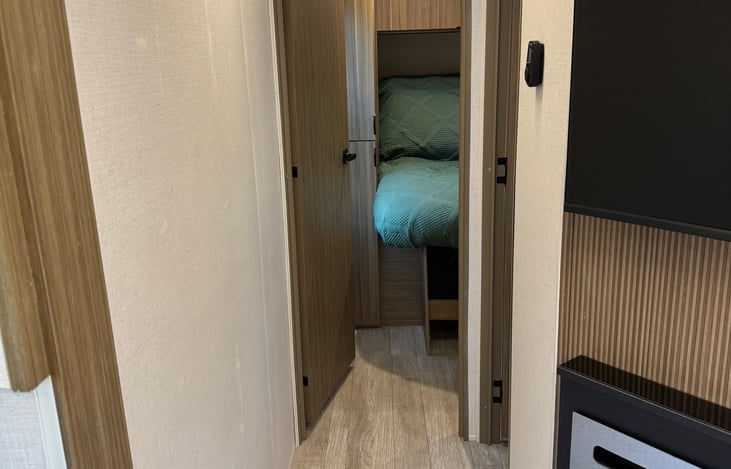 Hallway to private main bedroom.
