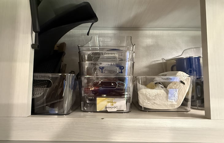 Cooking and eating utensil organized storage.