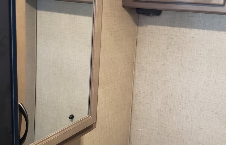 Bathroom sink and mirror.