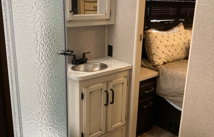 Bathroom with entrance from front & from private bedroom