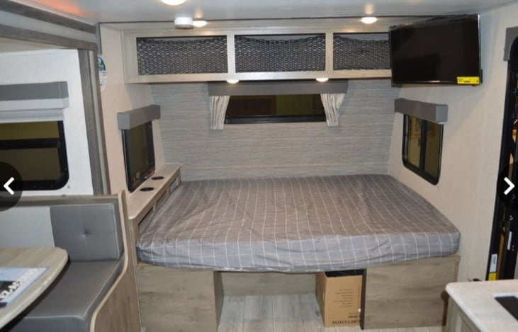 Grab a restful night's sleep in the FULL-SIZE Queen bed while catching your favorite shows. (Roku available)