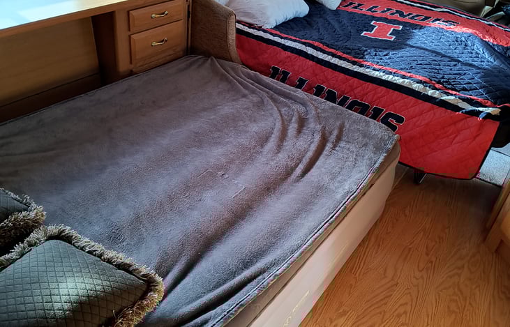 Full size Serta inflatable mattress included fits nicely in front of the 
Table