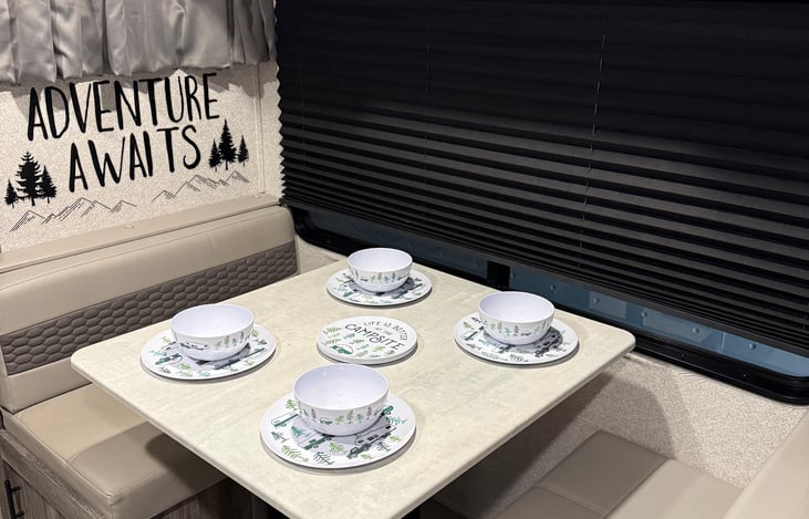 Dining table will fold into a bed for a 5th sleeping space.